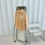 Upcycled Shirt with Real Feather Detail