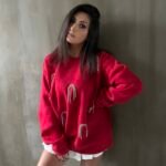 Limited Edition Oversized Red Sweatshirt with Hanging Rhinestone Arches